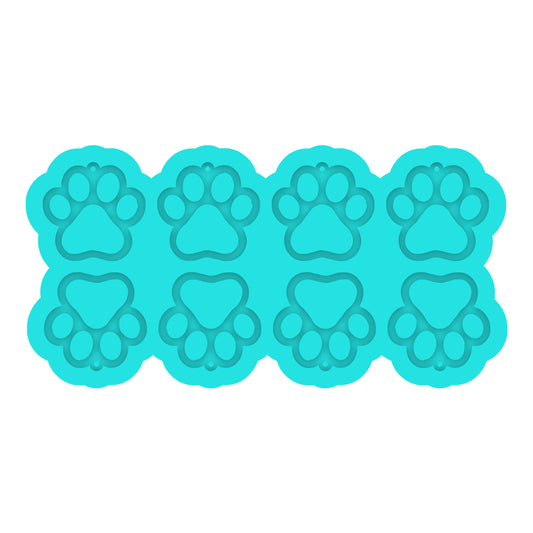 a set of three dog paw prints on a white background