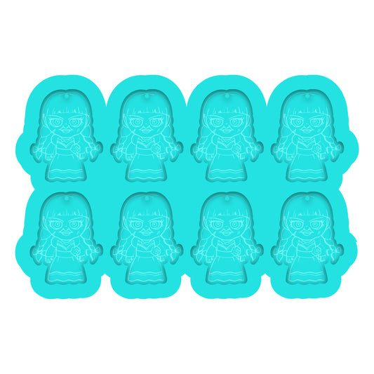 a set of six plastic molds of a girl with glasses