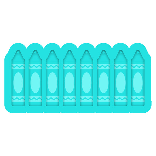 a row of blue plastic crayons on a white background